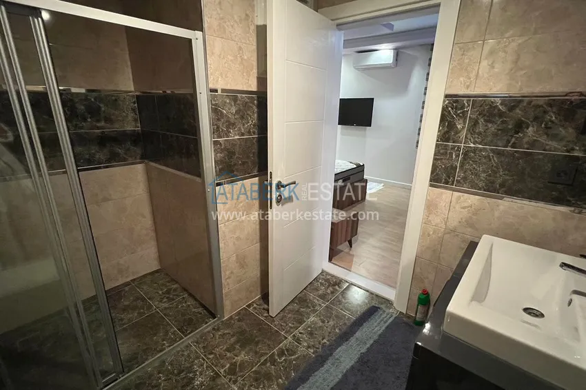 Приобрести Квартира в районе Махмутлар с мебелью и отдельной кухней 12 