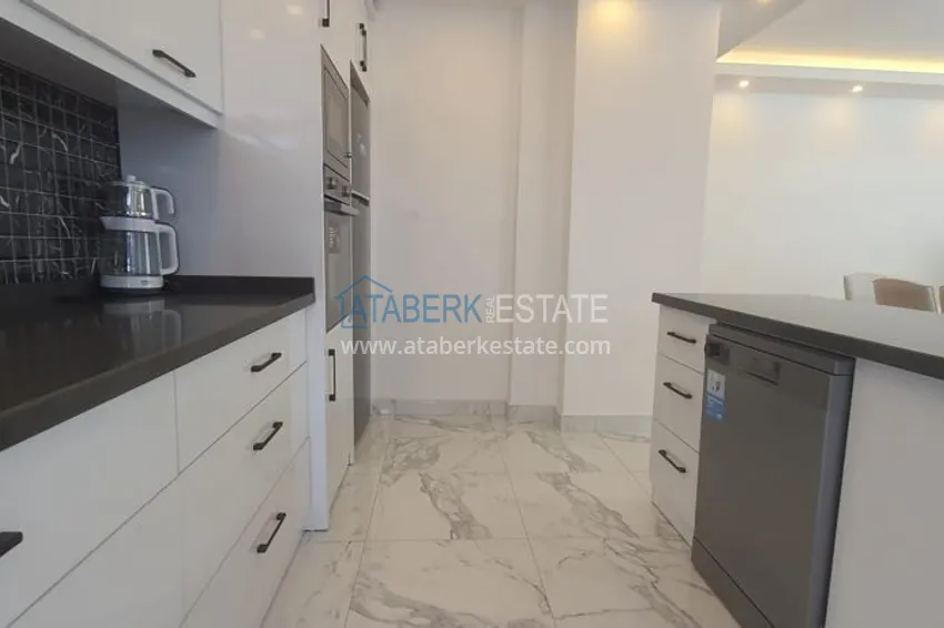 Приобрести Квартира в центре Алании - район пляжа Клеопатра, с современной мебелью и видом на горы  11 