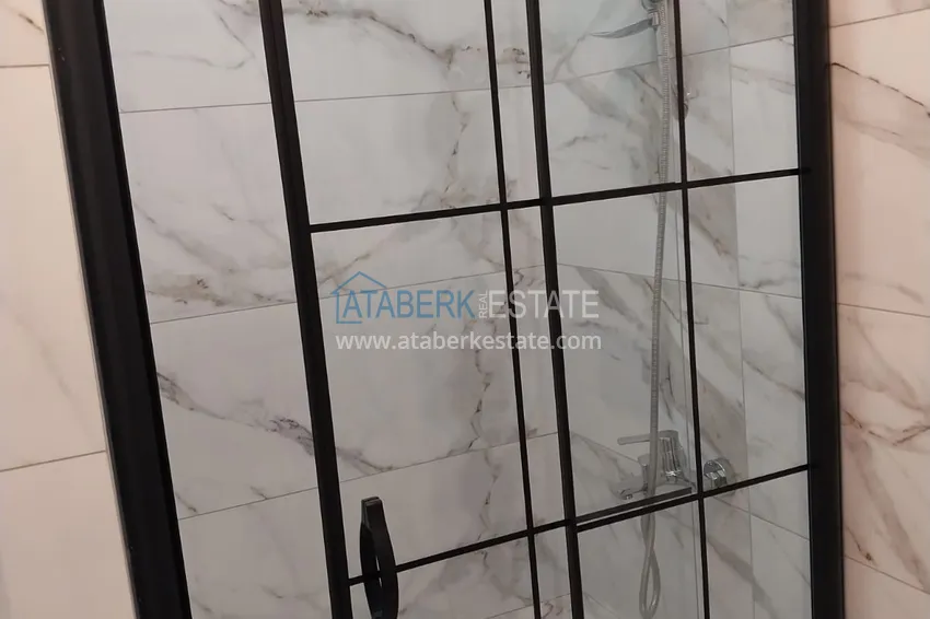 Приобрести Квартира в Махмутларе меблированная с видом на море и горы c великолепным месторасположением - в 50 метрах от центральной улицы района 11 