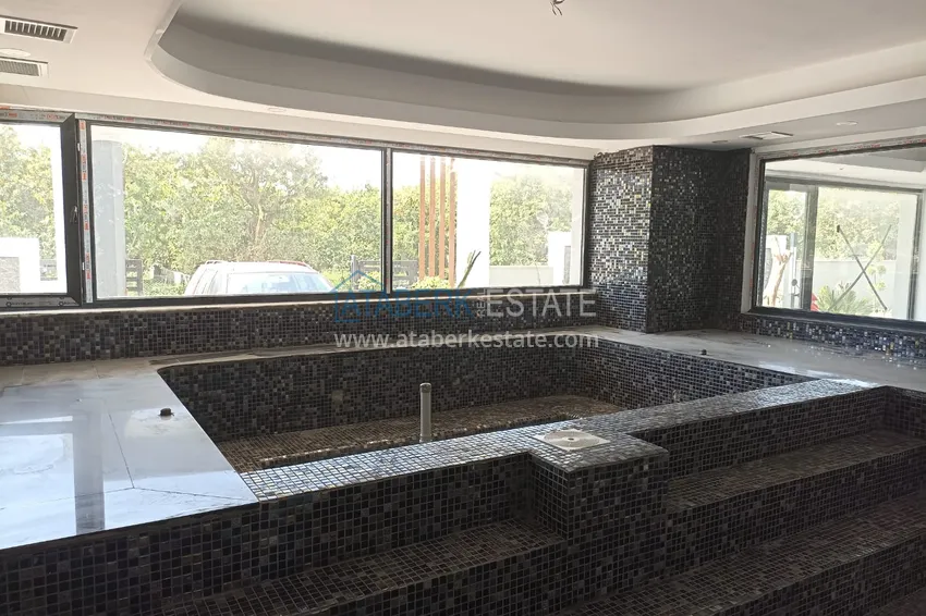 Квартира в Алании район Оба с чистовой отделкой в новостройке 9 