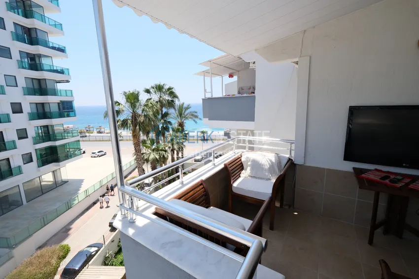 Приобрести Квартира в Махмутларе трехкомнатная с мебелью на 1 береговой линии 11 