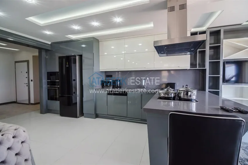 Приобрести Стильная квартира в историческом центре Алании, с дизайнерским интерьером и видом на порт 12 