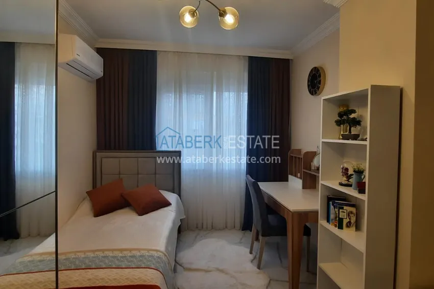 Приобрести Квартира в центре Махмутлара трехкомнатная с мебелью в бутик-комплексе  11 