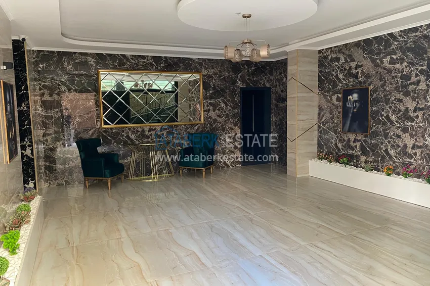 Квартира в Махмутларе с чистовой отделкой, в молодом элитном комплексе 10 