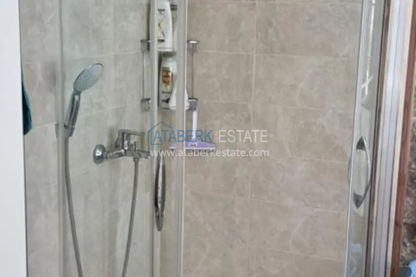 Приобрести Квартира в Махмутларе в благоустроенном жилом комплексе полностью готовая для проживанияи с мебелью с видом на море и горы 11 