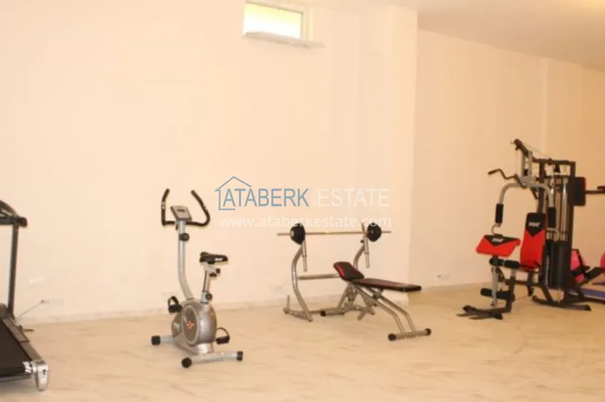 Квартира в районе Махмутлар с мебелью и отдельной кухней 11 