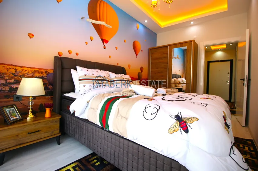 Приобрести Квартира в Махмутларе с новой мебелью в современном новом комплексе 13 