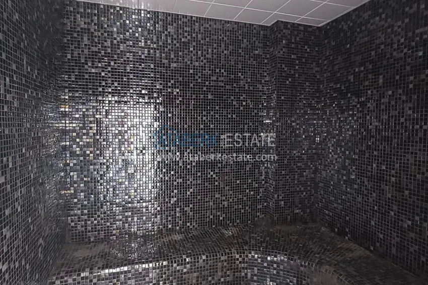 Квартира в Алании район Оба с чистовой отделкой в новостройке 10 