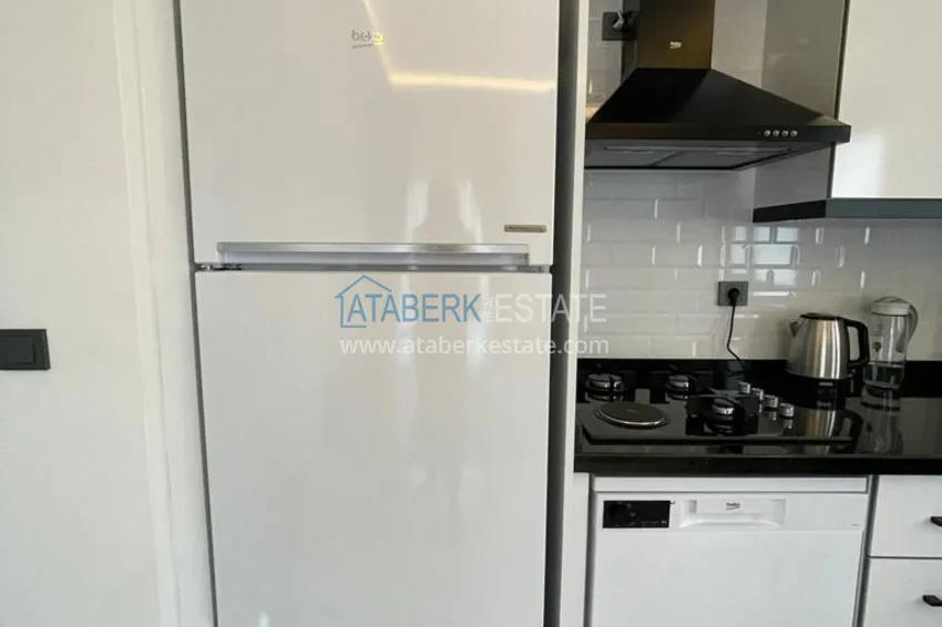 Приобрести Квартира в Махмутларе с мебелью в молодом элитном комплексе 11 