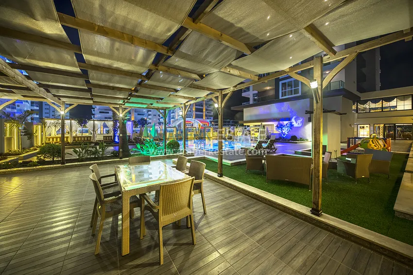 Квартира в Махмутларе с новой мебелью и застекленным балконом в комплексе комфорт-класса 10 