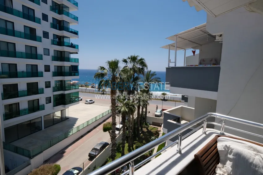 Приобрести Квартира в Махмутларе трехкомнатная с мебелью на 1 береговой линии 12 