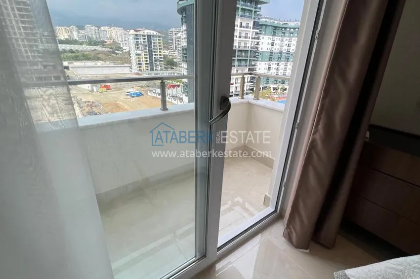 Приобрести Квартира в Махмутларе с новой мебелью и видом на горы в комплексе с отельной инфраструктурой 11 