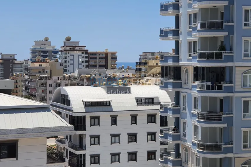 Приобрести Квартира в Махмутларе с мебелью и видом на море в резиденции отельного типа 11