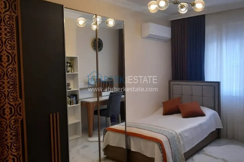 Приобрести Квартира в центре Махмутлара трехкомнатная с мебелью в бутик-комплексе  12 