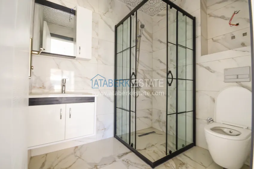 Приобрести Квартира в Махмутларе с видом на горы в современном жилом комплексе 10 