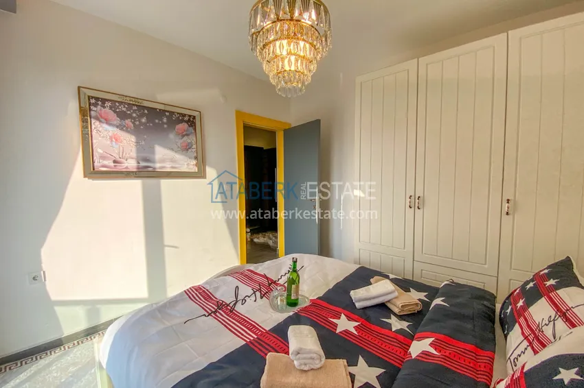 Приобрести Квартира в Махмутларе с новой мебелью и застекленным балконом в комплексе комфорт-класса 11 