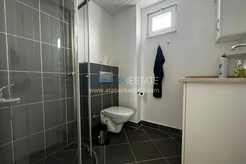 Приобрести Квартира в районе Тосмур с мебелью, открытым видом на море и горы 11 