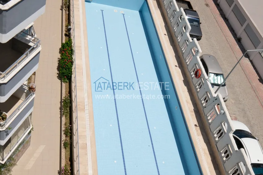 Приобрести Квартира в Махмутларе трехкомнатная с мебелью на 1 береговой линии 14 