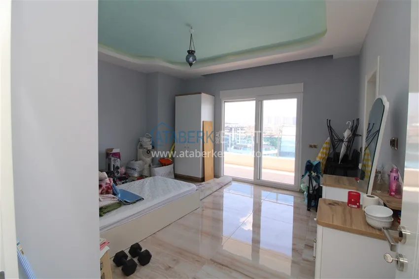 Приобрести Пентхаус в Махмутларе с мебелью, сауной и видом на море и горы 11