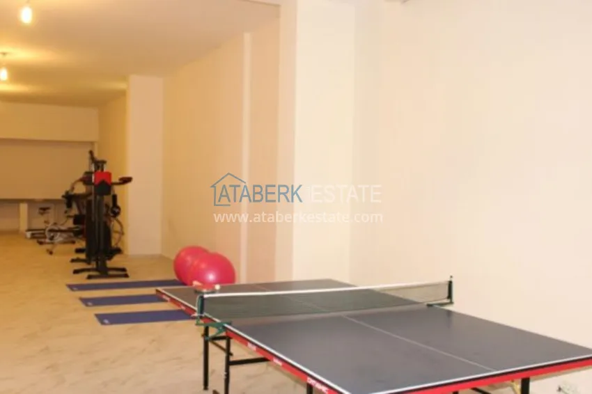 Квартира в районе Махмутлар с мебелью и отдельной кухней 12 