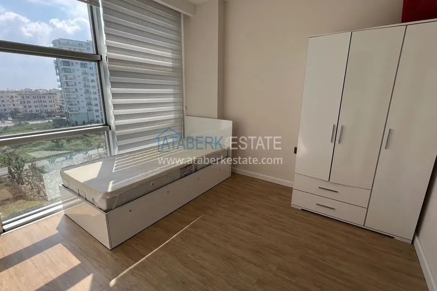 Приобрести Квартира в районе Махмутлар с мебелью и отдельной кухней 15 