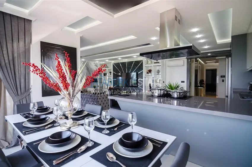 Приобрести Стильная квартира в историческом центре Алании, с дизайнерским интерьером и видом на порт 17 