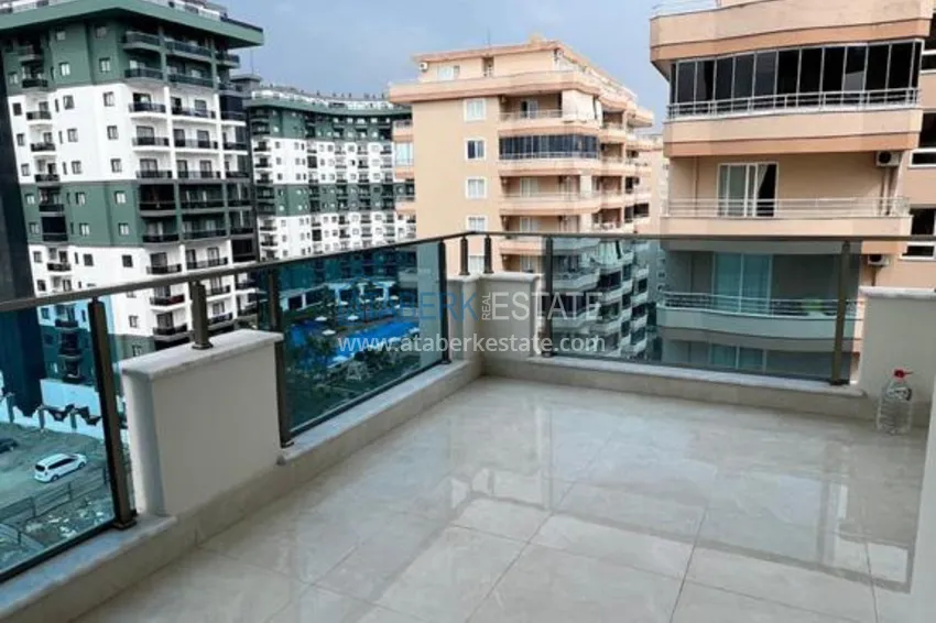 Приобрести Квартира в Махмутларе с новой мебелью и видом на горы в комплексе с отельной инфраструктурой 12 