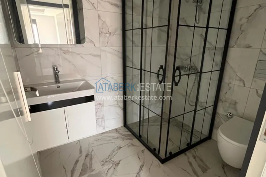 Приобрести Квартира в Махмутларе с видом на горы в современном жилом комплексе 11 