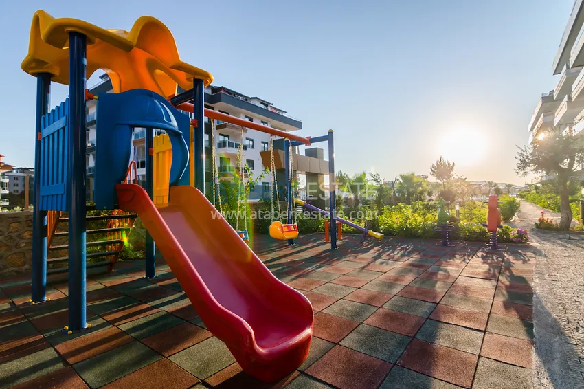 Дуплекс в Алании - район Оба, с отдельной кухней в элитной резиденции  14 