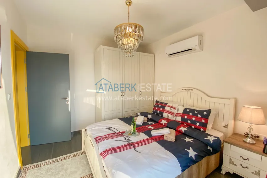 Приобрести Квартира в Махмутларе с новой мебелью и застекленным балконом в комплексе комфорт-класса 12 