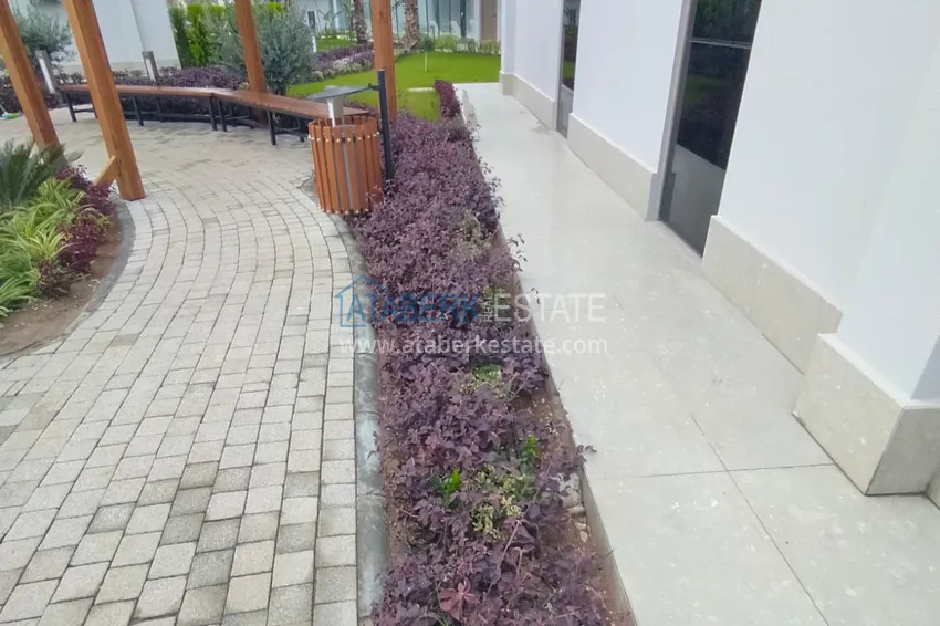 Квартира с выходом в сад в Анталии - район Хурма, меблированная с видом на горы 12 