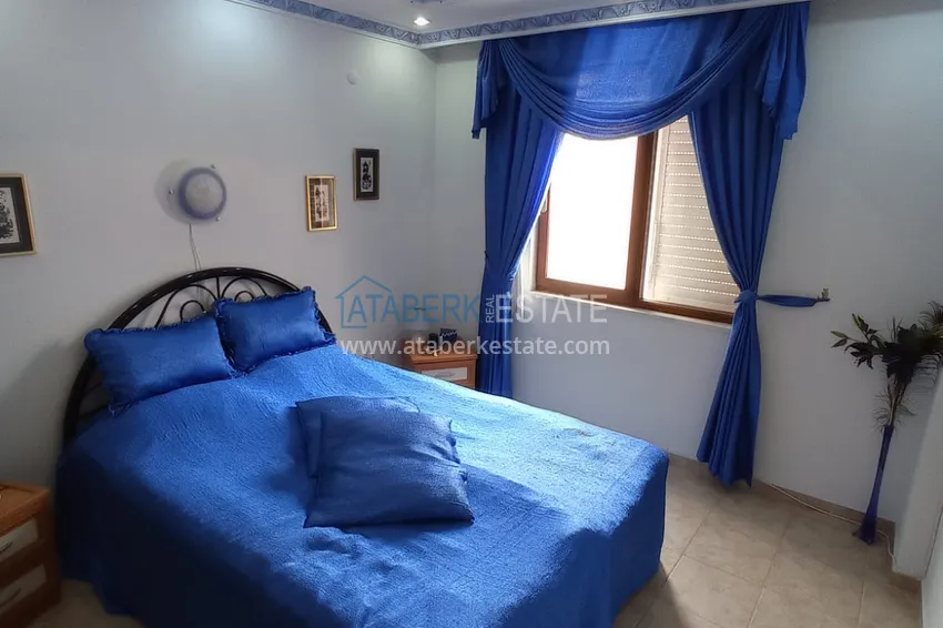 Приобрести Квартира в центре Алании четырехкомнатная с мебелью и отдельной кухней 15 