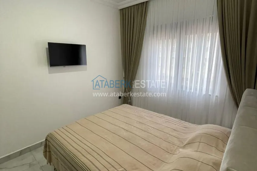 Приобрести Квартира в Махмутларе с мебелью в молодом элитном комплексе 13 