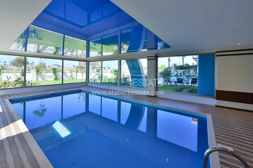 Квартира в Махмутларе с мебелью в комплексе премиум класса, на первой линии 18