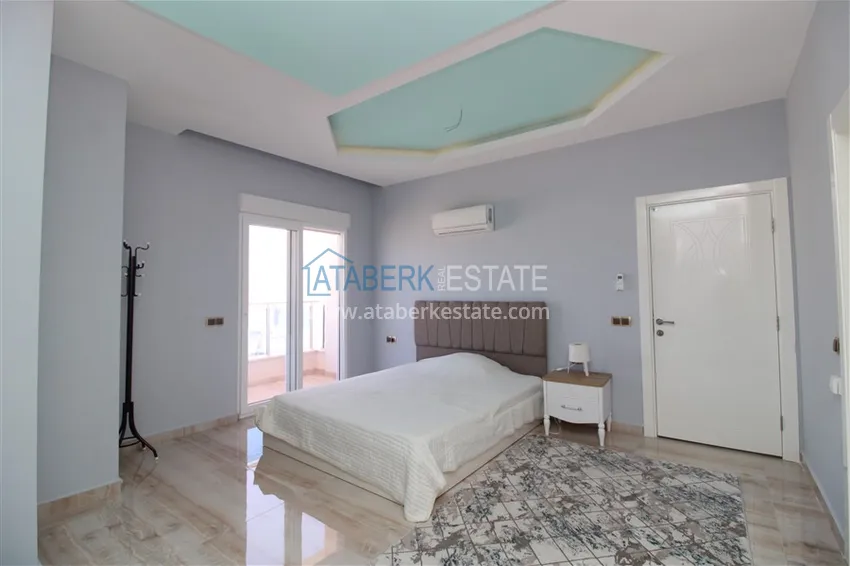 Приобрести Пентхаус в Махмутларе с мебелью, сауной и видом на море и горы 14