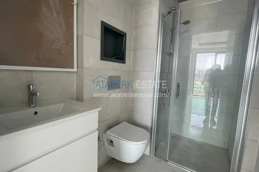 Приобрести Квартира в Махмутларе трёхкомнатная с видом на море и горы 14 