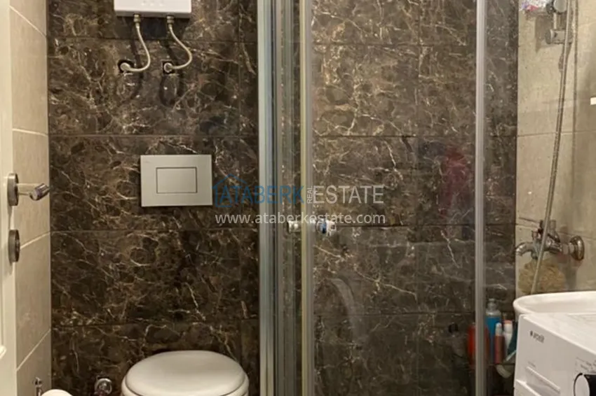 Приобрести Квартира в центре Махмутлара с мебелью в комплексе с инфраструктурой 14 