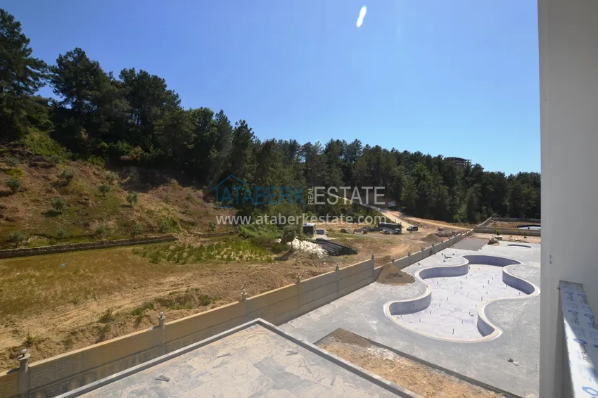 Приобрести Квартира в районе Авсаллар в новом современном комплексе на завершающем этапе строительства 15 