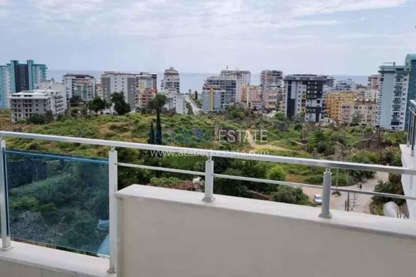 Приобрести Квартира в Махмутларе в благоустроенном жилом комплексе полностью готовая для проживанияи с мебелью с видом на море и горы 13 