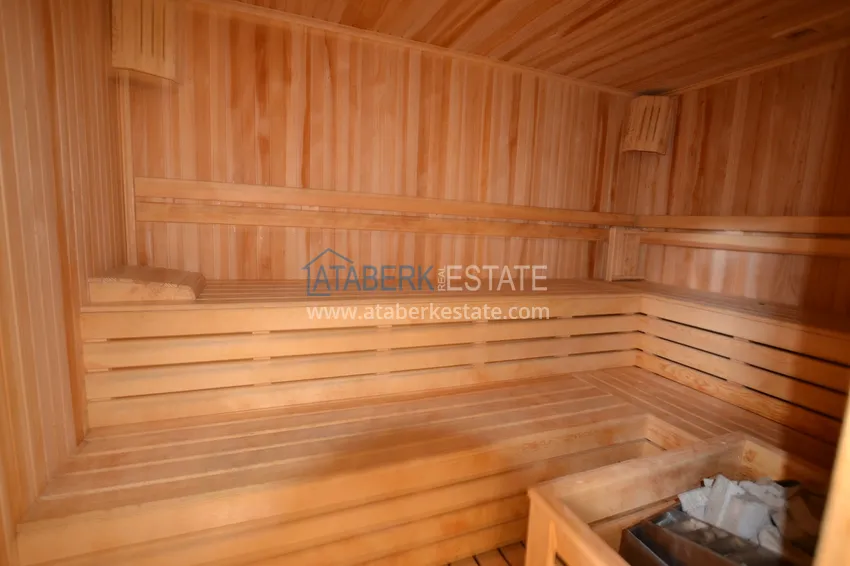 Квартира в районе Махмутлар с мебелью и отдельной кухней 13 