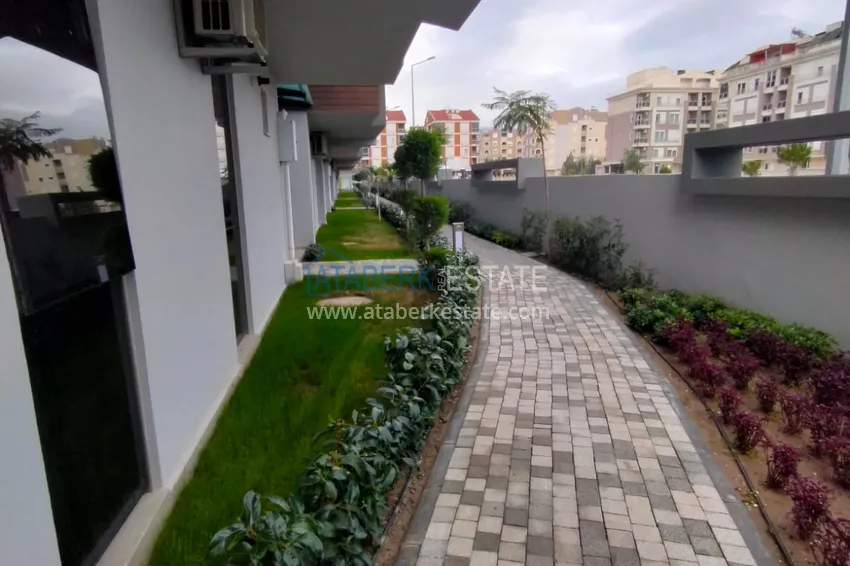 Квартира с выходом в сад в Анталии - район Хурма, меблированная с видом на горы 13 