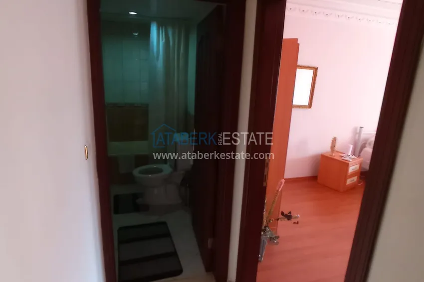 Приобрести Квартира в центре Алании четырехкомнатная с мебелью и отдельной кухней 16 