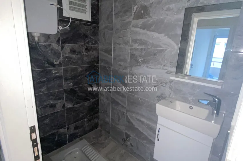 Приобрести Квартира в центре Махмутлара – район вторничного рынка, трехкомнатная 13 