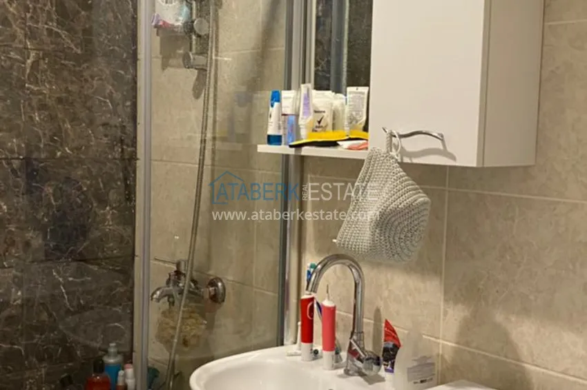 Приобрести Квартира в центре Махмутлара с мебелью в комплексе с инфраструктурой 15 