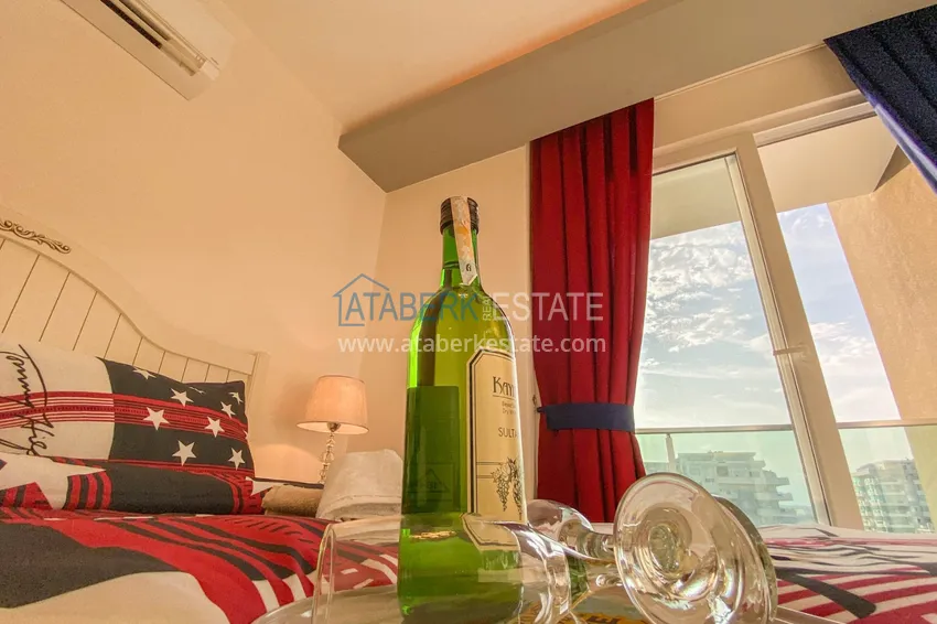 Приобрести Квартира в Махмутларе с новой мебелью и застекленным балконом в комплексе комфорт-класса 14 