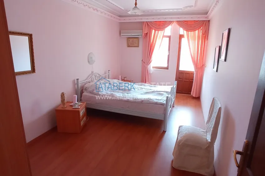 Приобрести Квартира в центре Алании четырехкомнатная с мебелью и отдельной кухней 17 