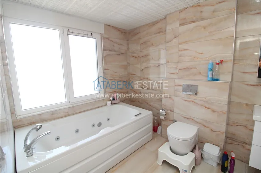 Приобрести Пентхаус в Махмутларе с мебелью, сауной и видом на море и горы 16