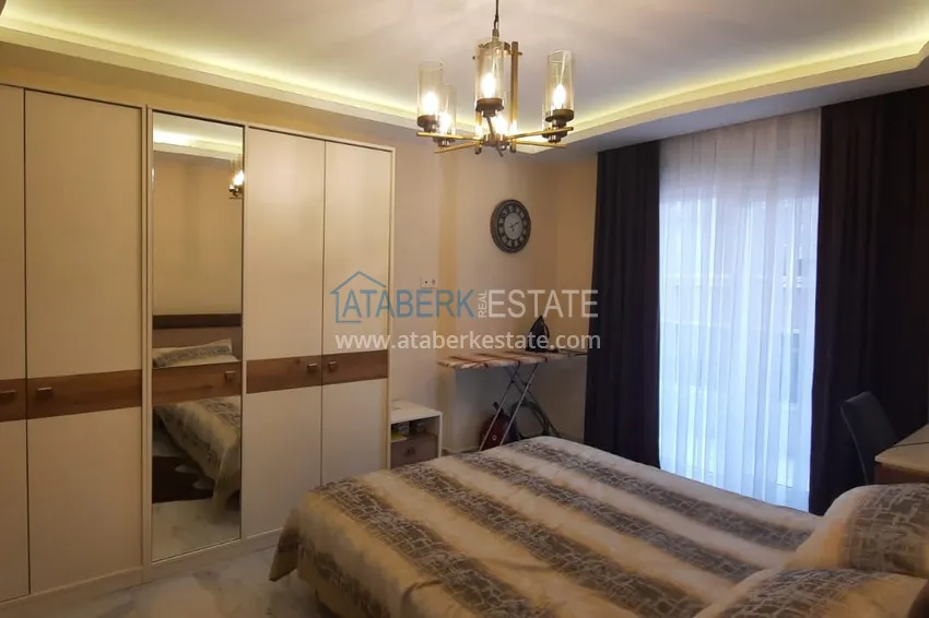 Приобрести Квартира в центре Махмутлара трехкомнатная с мебелью в бутик-комплексе  16 