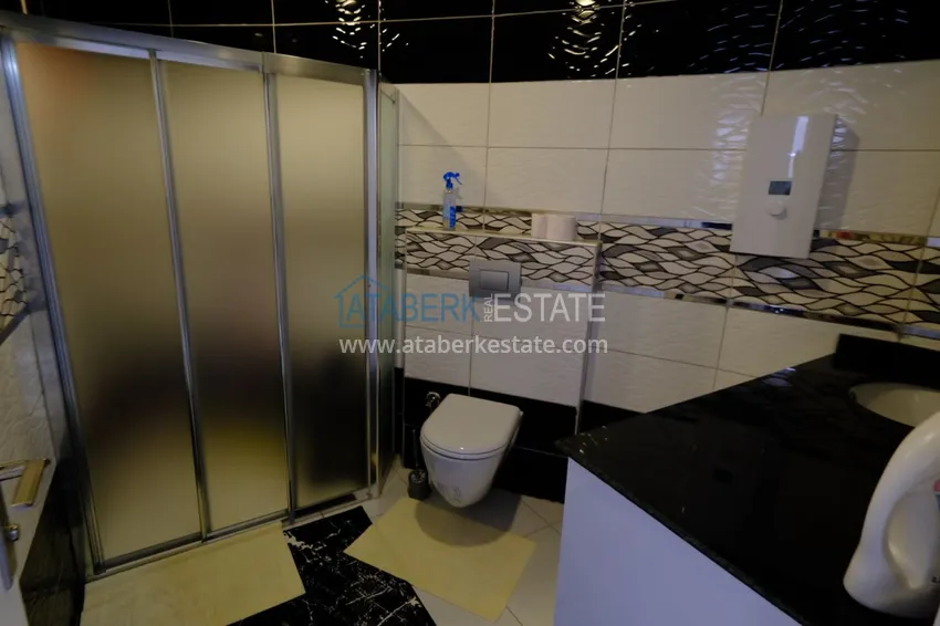 Приобрести Пентхаус-дуплекс в Махмутларе с мебелью и видом на море и горы 17 