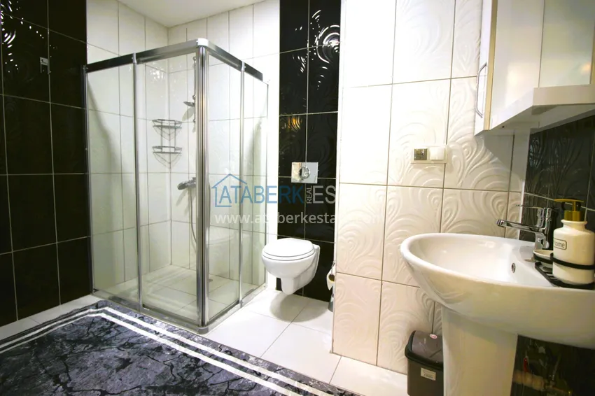 Приобрести Квартира в Махмутларе меблированная с видом на море с наилучшим месторасположением 18 